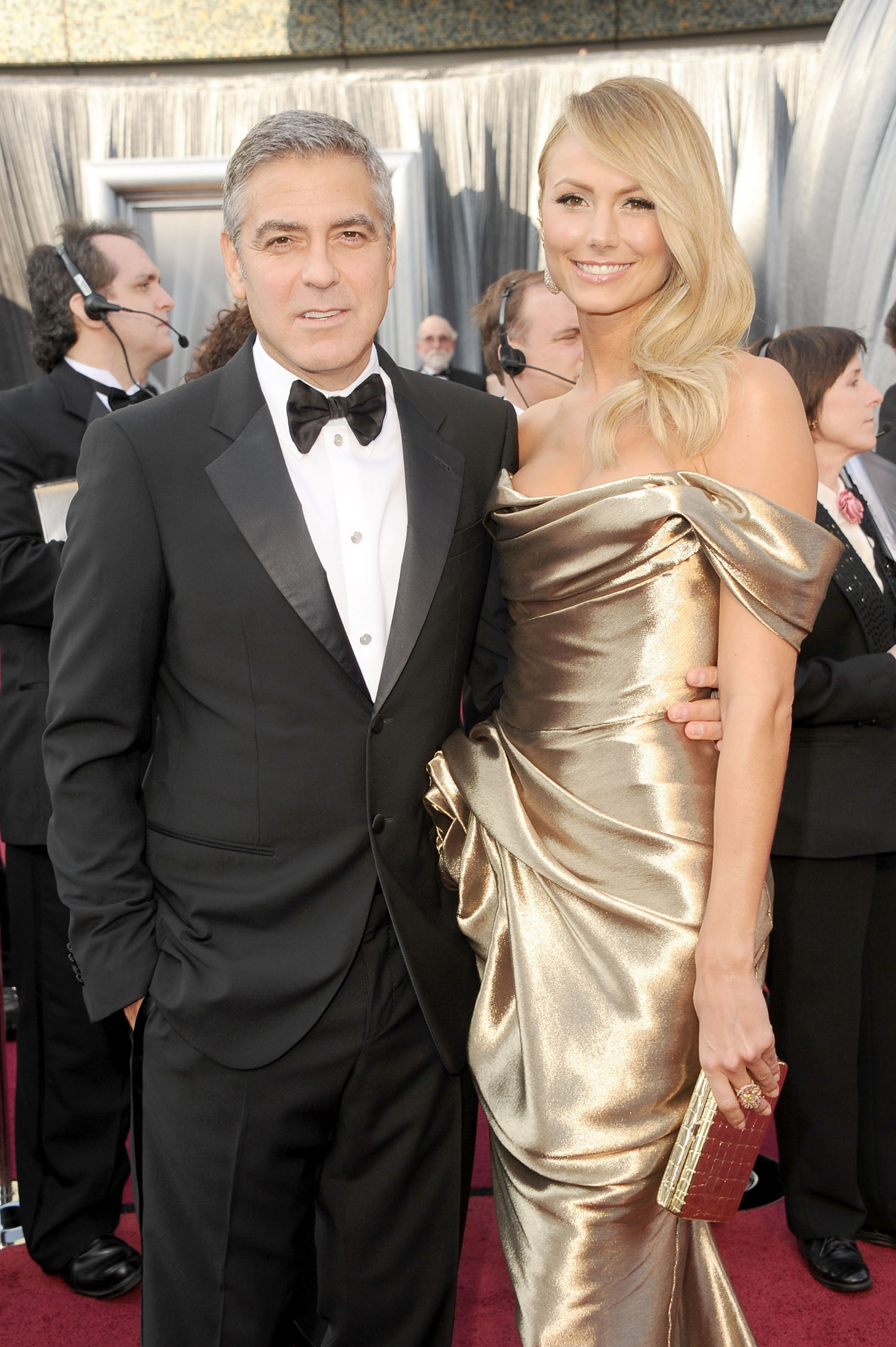 HOLLYWOOD, CA - FEBRUARY 26:  Actor George Clooney (L) and Stacy Keibler arrive at the 84th Annual Academy Awards held at the Hollywood & Highland Center on February 26, 2012 in Hollywood, California.  (Photo by Jason Merritt/Getty Images)